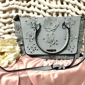 Adorable baby blue, floral bag. Perfect for spring.